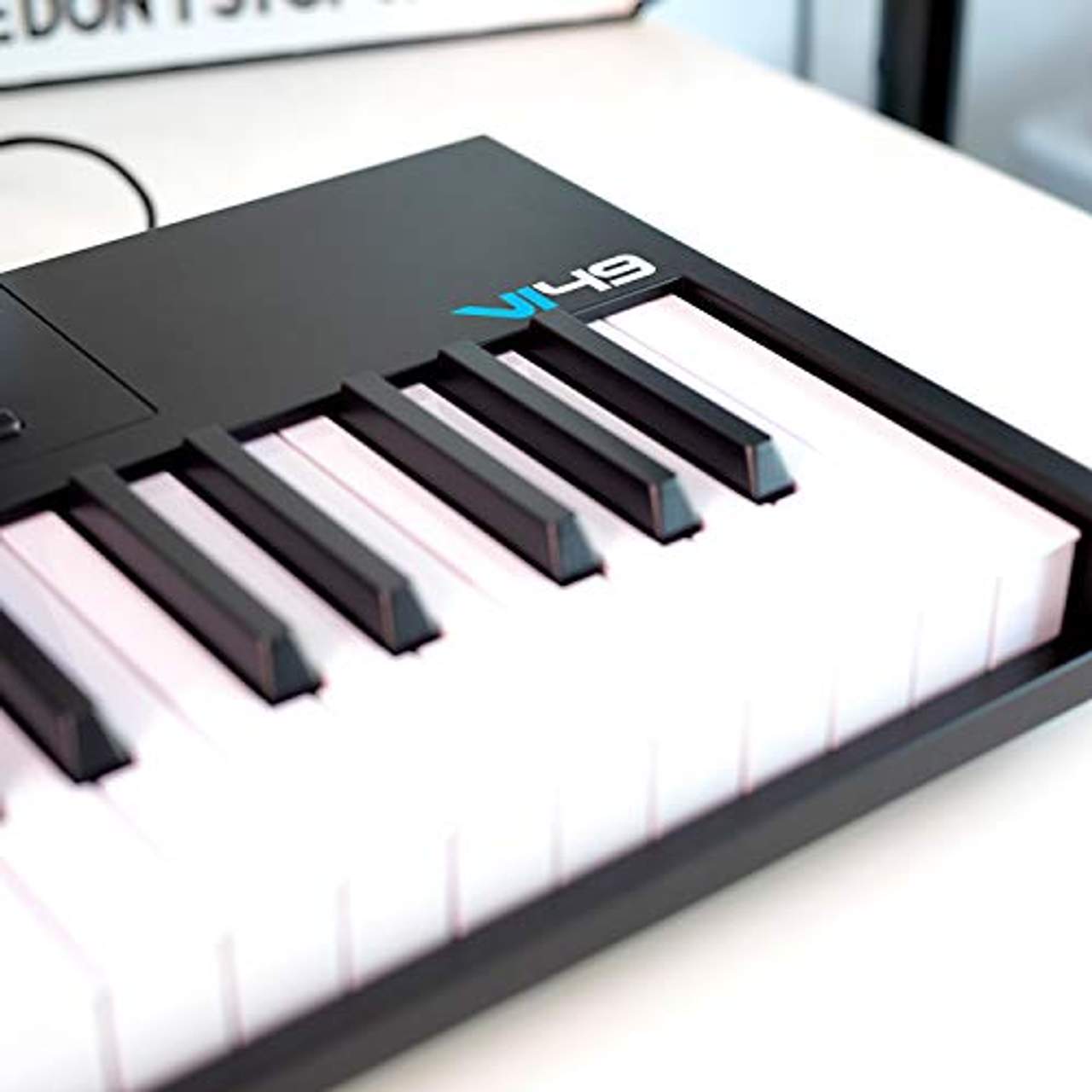 Alesis VI49 49 -Tasten-USB-MIDI-Keyboard mit 16 Pads